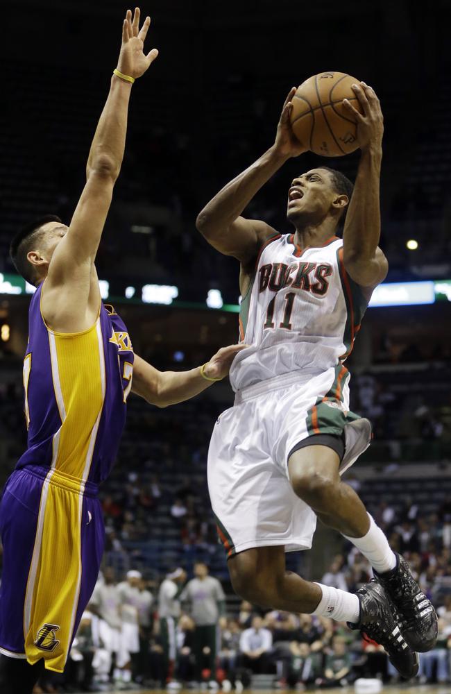 Milwaukee Bucks' Brandon Knight (11) shoots over Los Angeles Lakers' Jeremy Lin.