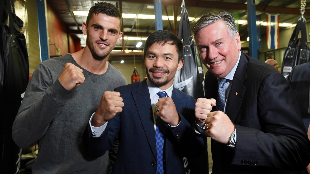 Scott Pendlebury with world champion boxer Manny Pacquiao and former Collingwood president Eddie McGuire. Picture: Kylie Else