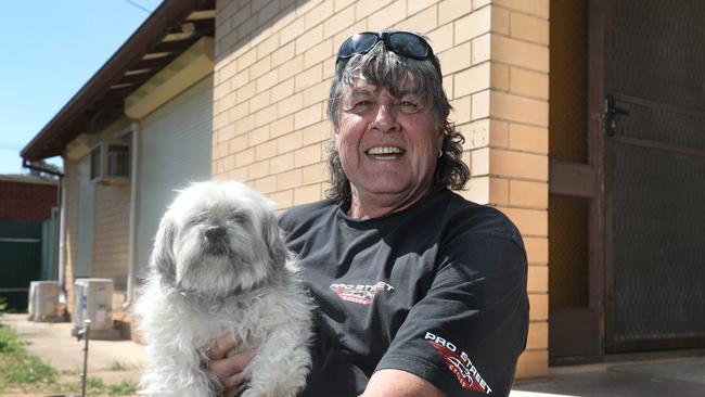 Nick Lambeff and his dog Alex at his rental at Smithfield Plains. Picture Dean Martin