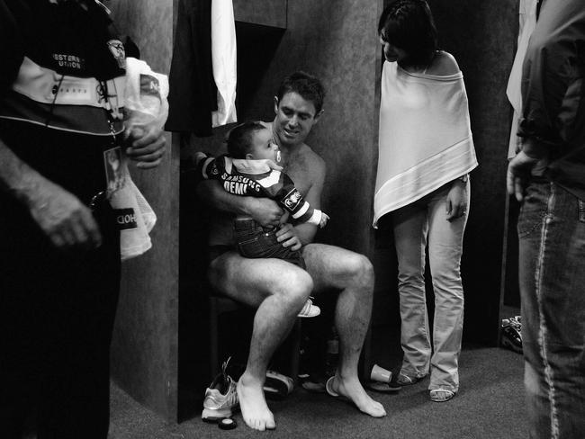 Brad Fittler of the Roosters with his wife and child after losing the 2004 NRL Grand Final against the Bulldogs. (Photo by Adam Pretty/Getty Images)