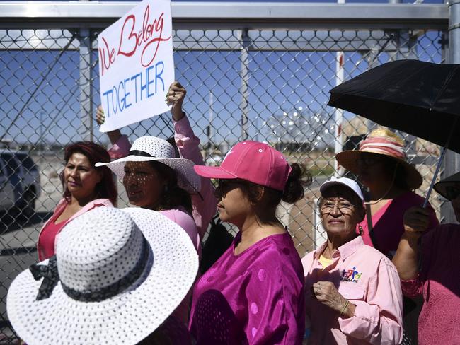 Activists gather at the gate near the border crossing fence at the Tornillo Port of Entry near El Paso, Texas, June 21, 2018 during a protest rally. Picture: AFP