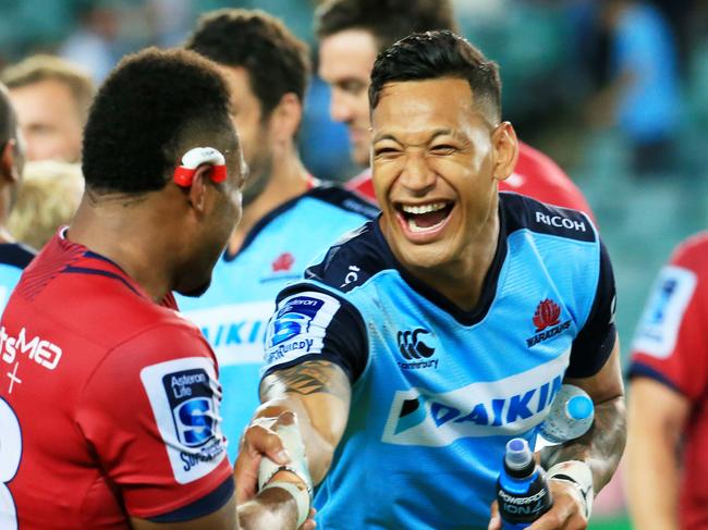 Israel Folau of the Waratahs with Samu Kerevi of the Reds   after the NSW Waratahs v Queensland Reds Super Rugby game at Allianz Stadium, Moore Park. pic Mark Evans