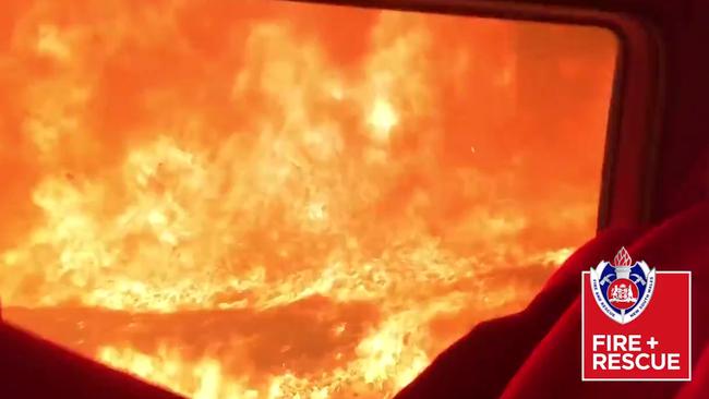 The crew from Fire and Rescue NSW Station 509 Wyoming recorded this video showing the moment their truck was overrun by the bushfire burning South of Nowra. Picture: NSW Fire and Rescue