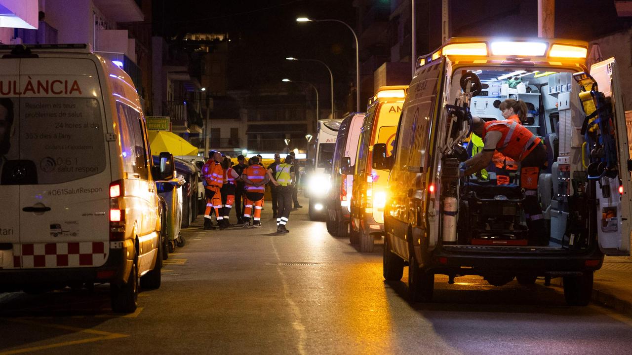 Ambulance and firefighter vehicles rushed to the scene. Picture: Jaime Reina / AFP