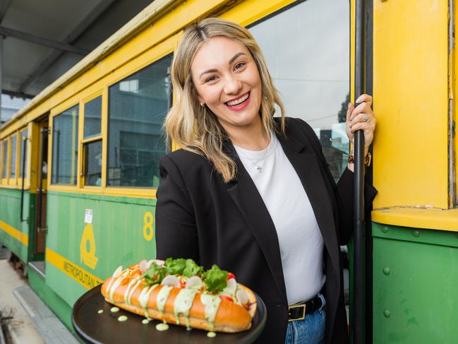 Katie Devic at her Carnegie cafe Major Mitchell which is embarking on a new project to convert an old Melbourne tram in its backyard into a functioning restaurant. Picture: Jason Edwards