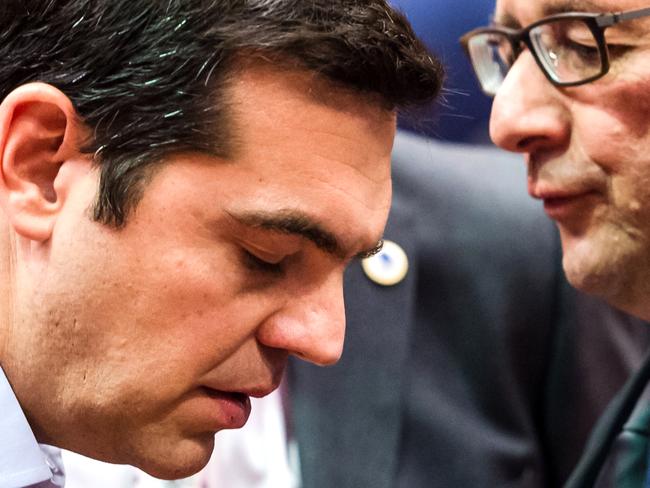 Stalemate ... Greek Prime Minister Alexis Tsipras, left, speaks with French President Francois Hollande during a meeting of eurozone heads of state. Picture: AP Photo/Geert Vanden Wijngaert