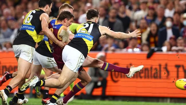 Joe Daniher gets his boot to the matchwinning goal. Picture: Chris Hyde/AFL Photos/via Getty Images