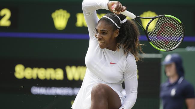 Serena Williams returns during her victory over Russia's Evgeniya Rodina during their women's singles match on day seven of the Wimbledon Tennis Championships in London. Photo: AP