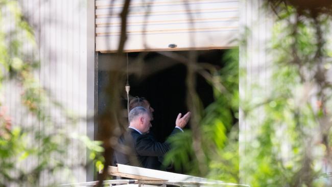 An SA Police Major Crime detective opens the shed for a Supreme Court jury to enter. Picture: Tim Joy