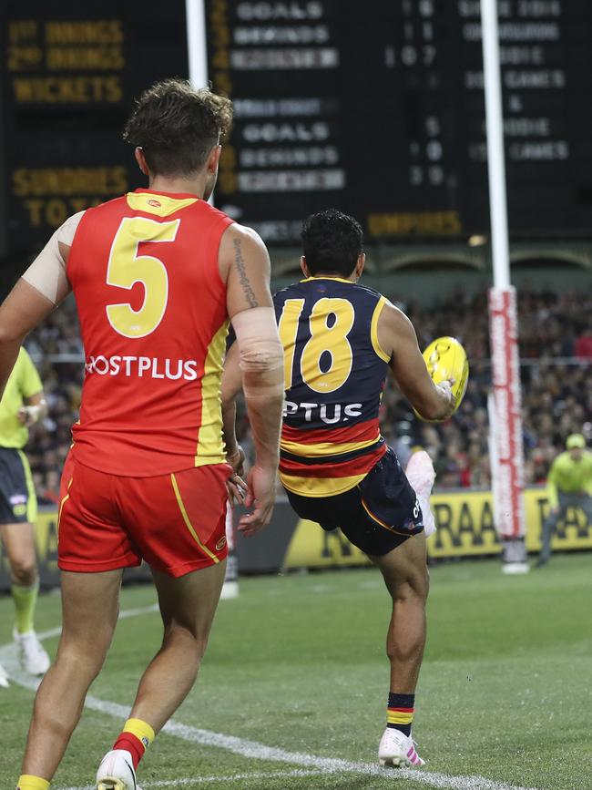 Eddie Betts leaves Jarrod Harbrow in his wake and slots truly from the boundary line in his 300th game. Picture SARAH REED