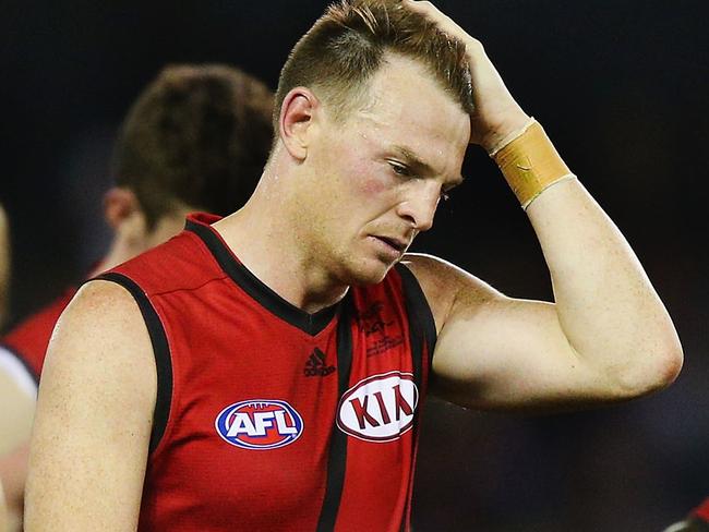 MELBOURNE, AUSTRALIA - MAY 22: Brendon Goddard of the Bombers (C) and teammates look dejected after defeat during the round nine AFL match between the St Kilda Saints and the Essendon Bombers at Etihad Stadium on May 22, 2016 in Melbourne, Australia. (Photo by Michael Dodge/Getty Images)