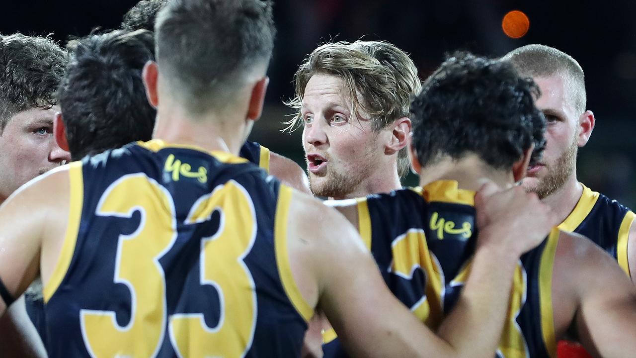 Sloane talks to the players before walking off the ground in the last game of the year. Picture: Sarah Reed