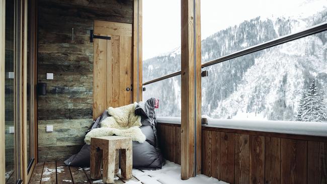 The balcony and its sheepskin covered beanbag, Mooser Hotel.