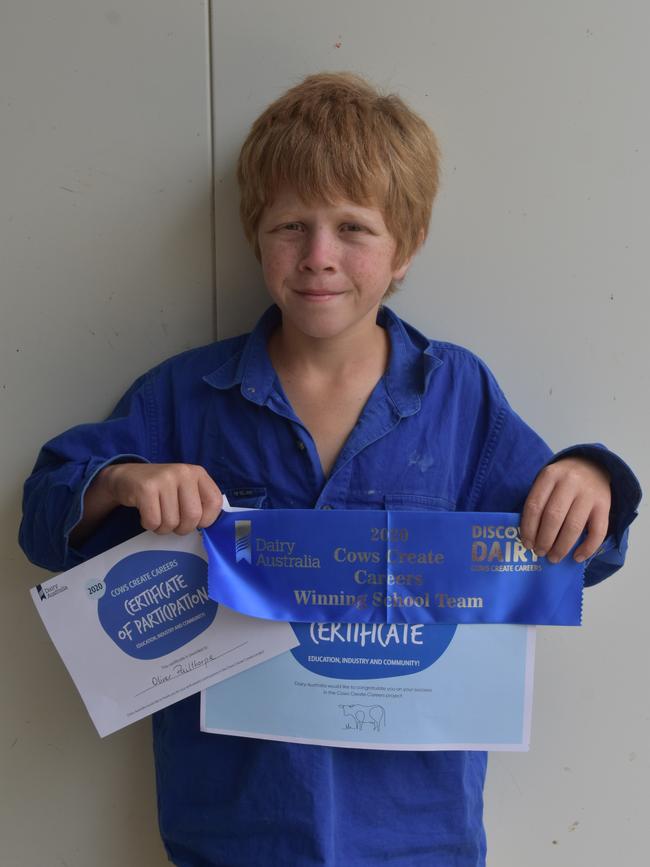 Oliver Pailthorpe holding up his certificates and ribbon. (Picture: Contributed)