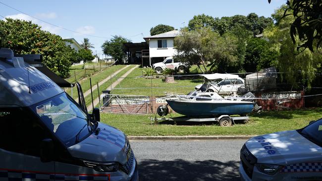 Queensland Police officers guard a crime scene at Love Street, Mareeba, where a man armed with a knife was shot dead by police after a tense, hours long stand off on Saturday afternoon. Picture: Brendan Radke