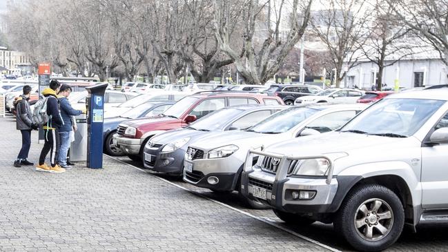 Visitors pay for parking at Salamanca. Picture Eddie Safarik