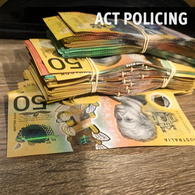 Cash found at John Wright's Braddon Unit. Picture: ACT Policing