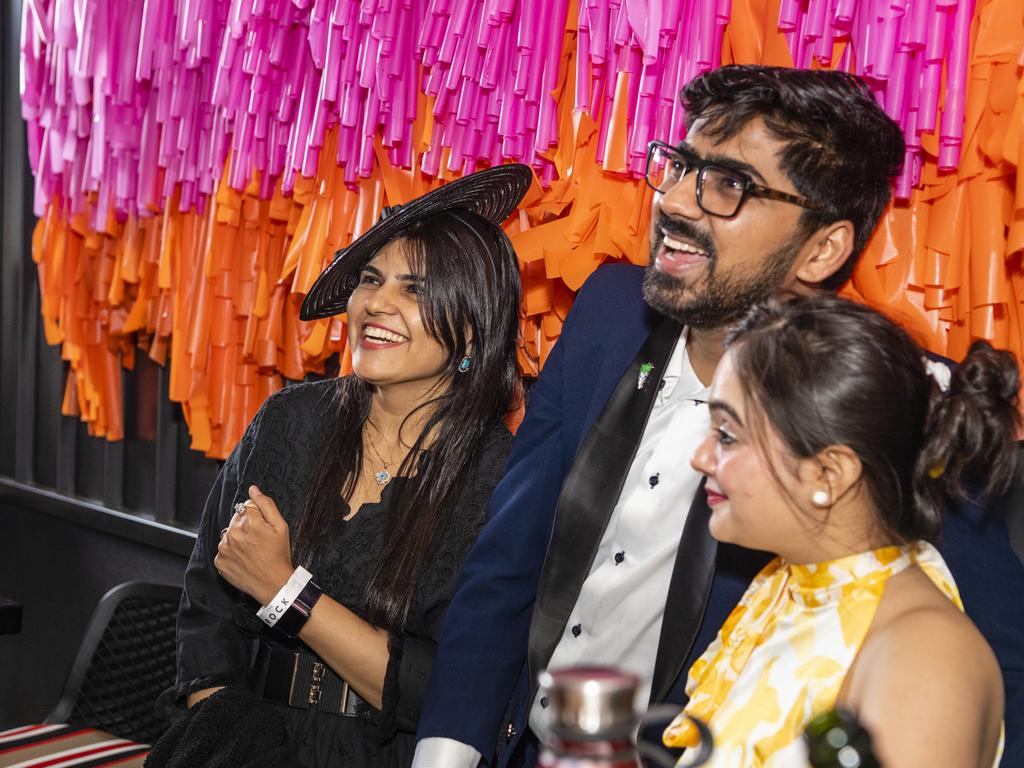 Reacting during the Melbourne Cup race are (from left) Brinda Desai, Nishant Kishnani and Dea Kishnani at The Rock Melbourne Cup party, Tuesday, November 1, 2022. Picture: Kevin Farmer