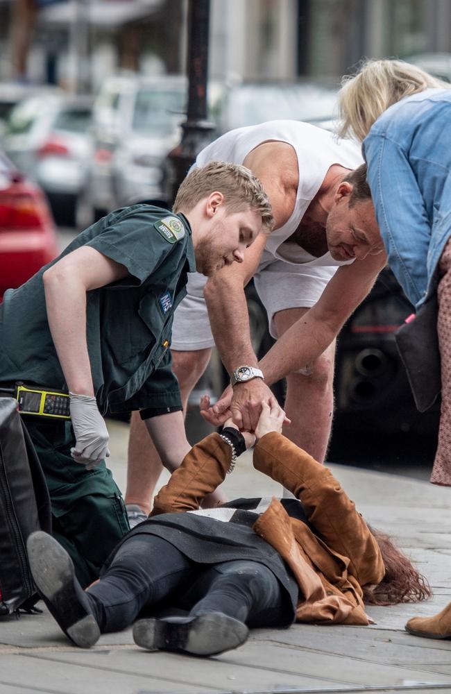 Donovan held hands with the woman as paramedics arrived. Picture: BACKGRID.