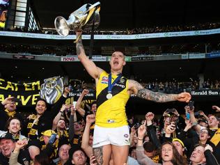 The Tigers' Dustin Martin celebrates with the Premiership Cup after Richmond defeated the Adelaide Crows in the 2017 AFL Grand Final at the MCG. Picture: Phil Hillyard