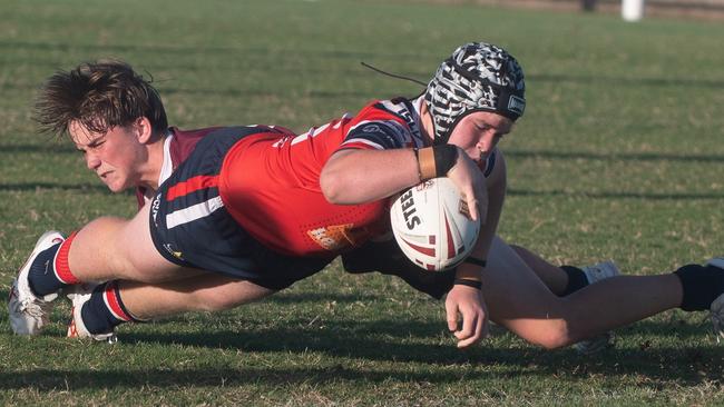 Sangwani Chinula goes in for a try for St Patrick’s College. Picture: Michaela Harlow