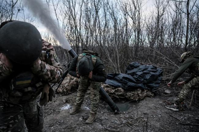 Ukrainians in the 24th Mechanized Brigade firing towards Russian positions near Chasiv Yar in the Donetsk region