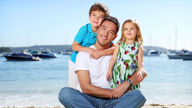 Gold Dinner co-chair Joshua Penn — pictured with his children Brooklyn, 6, and Blake, 3 — has set an ambitious fundraising target for this year’s Gold Dinner. Picture: Tim Hunter