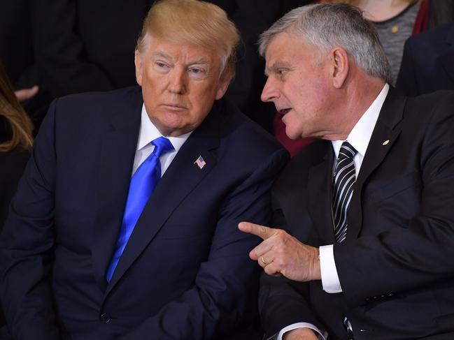 US President Donald Trump (L) listens to Billy Graham's eldest son Rev. Franklin Graham during the memorial service for Reverend Billy Graham in the Rotunda of the US Capitol in Washington, DC. Picture: AFP