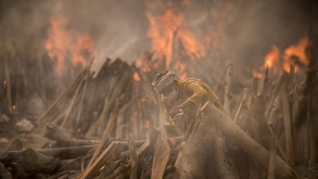 A new wave of the pandemic has totally overwhelmed India’s healthcare services and has caused crematoriums to operate day and night as the number of victims continues to spiral out of control. Picture: Anindito Mukherjee/Getty Images