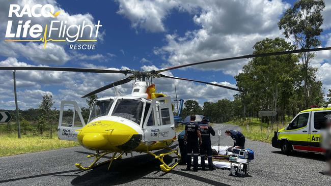 A woman had to be taken to hospital after being bit by a snake at a Miriam Vale rest stop.