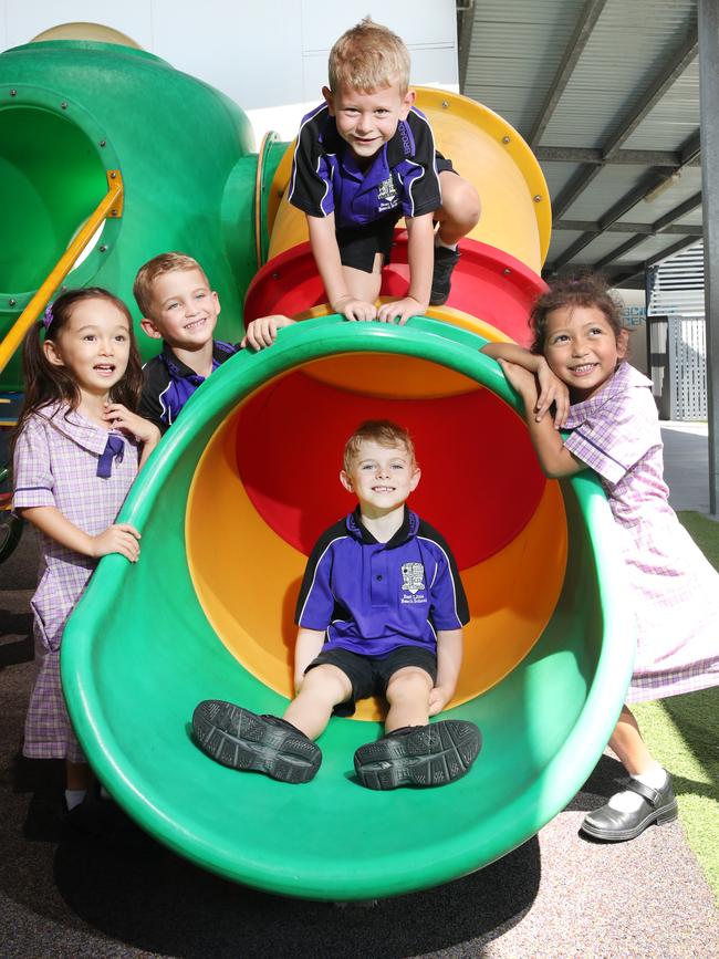 Broadbeach State School Prep Classes for My First Year. Prep in in the playground, from left, Florence, Beau J, Beau P, Leo (in pipe), Kiana. . Picture Glenn Hampson