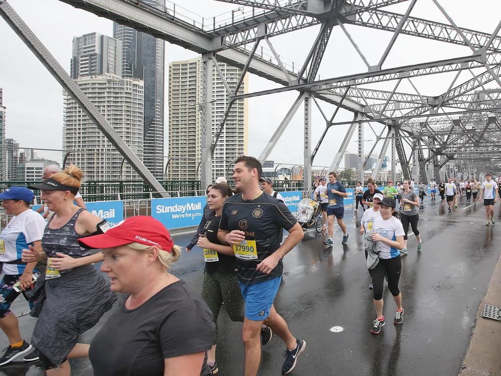 <p>Runners on the Story Bridge at the Sunday Mail Bridge to Brisbane fun Run, Sunday August 26, 2018. (AAP Image/Jono Searle)</p>