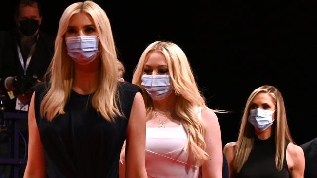 (From L) Daughter and Senior Advisor to the US President Ivanka Trump, daughter of the US President Tiffany Trump, campaign adviser to the US President and Eric Trump's wife Lara Trump wear facemasks as they arrive to attend the final presidential debate at Belmont University in Nashville, Tennessee, on October 22, 2020. (Photo by JIM WATSON / AFP)