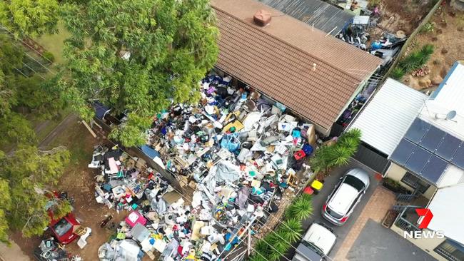 You don’t want to buy next to a hoarder house. Picture: 7NEWS
