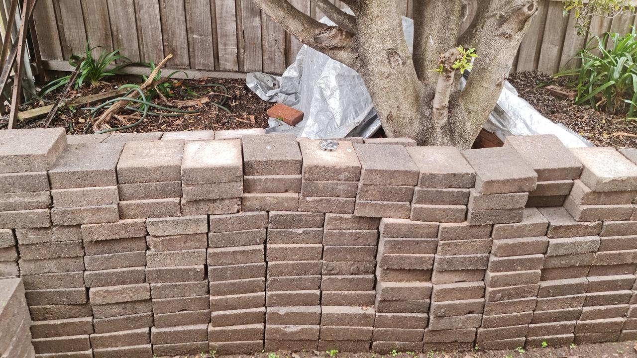 Bricks left in the garden. Picture: Supplied