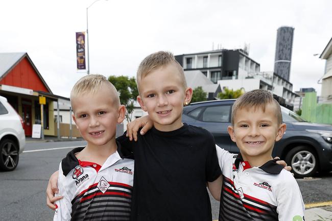 Tanner Chalker, 7, Jaycee Chalker, 8, and Tyla Porter, 7 pictured at the Broncos v Rabbitohs, round 1, on Caxton Street, Brisbane 11th of March 2022. This is the first game for the BroncosÃ• season.