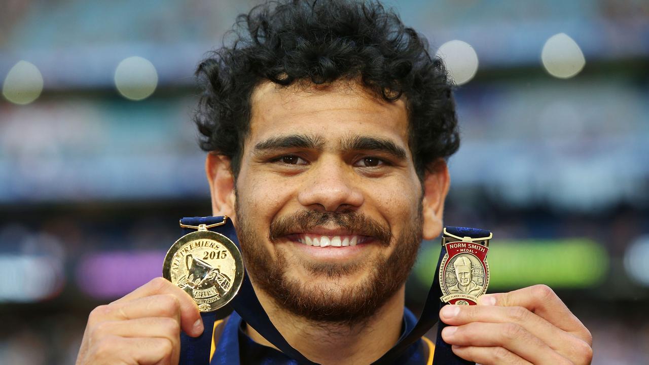 Cyril Rioli with his premiership and Norm Smith Medal in 2015.