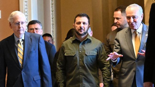 Volodymyr Zelensky flanked by Republican Senate Leader Mitch McConnell and Democrat leader Chuck Schumer at the US Capitol on Thursday. Picture: AFP