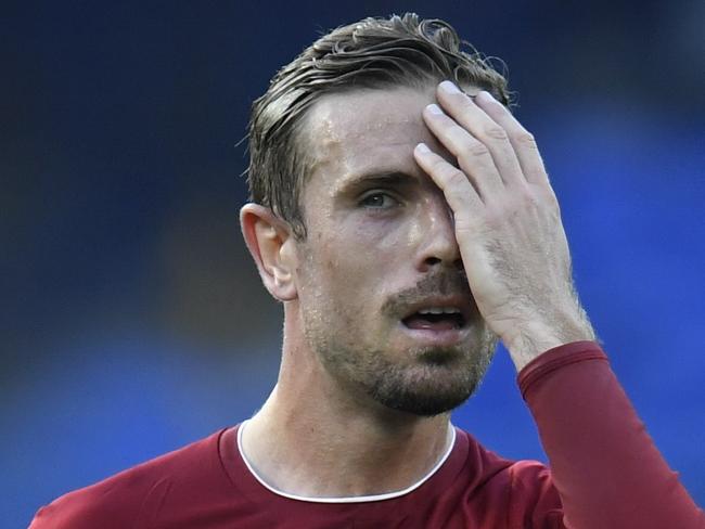 Liverpool???s Jordan Henderson leaves the pitch at half time during the English Premier League soccer match between Everton and Liverpool at Goodison Park in Liverpool, England, Sunday, June 21, 2020. (Peter Powell/Pool via AP)