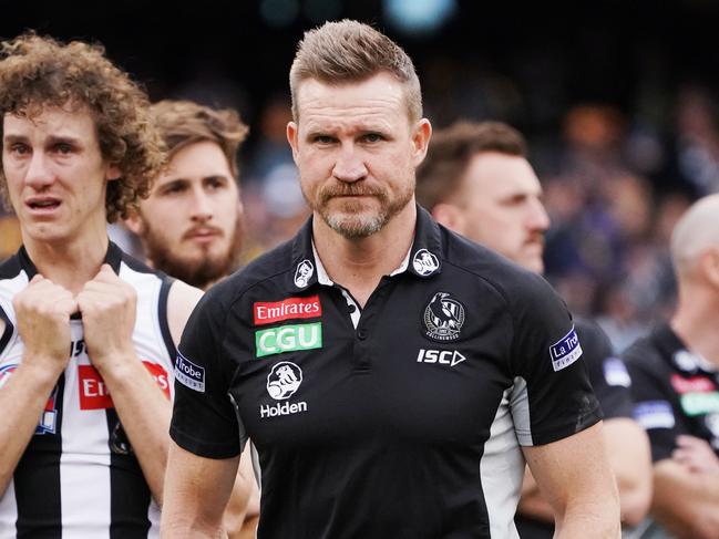 MELBOURNE, VICTORIA - SEPTEMBER 29:  Magpies head coach Nathan Buckley look dejected after defeat after their defeat  during the 2018 AFL Grand Final match between the Collingwood Magpies and the West Coast Eagles at Melbourne Cricket Ground on September 29, 2018 in Melbourne, Australia.  (Photo by Michael Dodge/AFL Media/Getty Images)