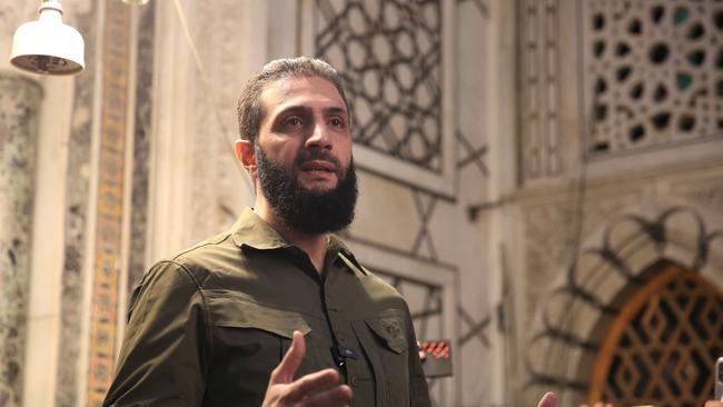 The leader of Syria's Islamist Hayat Tahrir al-Sham (HTS) group that headed a lightning rebel offensive snatching Damascus from government control, Abu Mohammed al-Jolani, now using his real name Ahmed al-Sharaa, above. He addresses a crowd at the capital's landmark Umayyad Mosque on December 8. Picture: Aref Tammawi / AFP