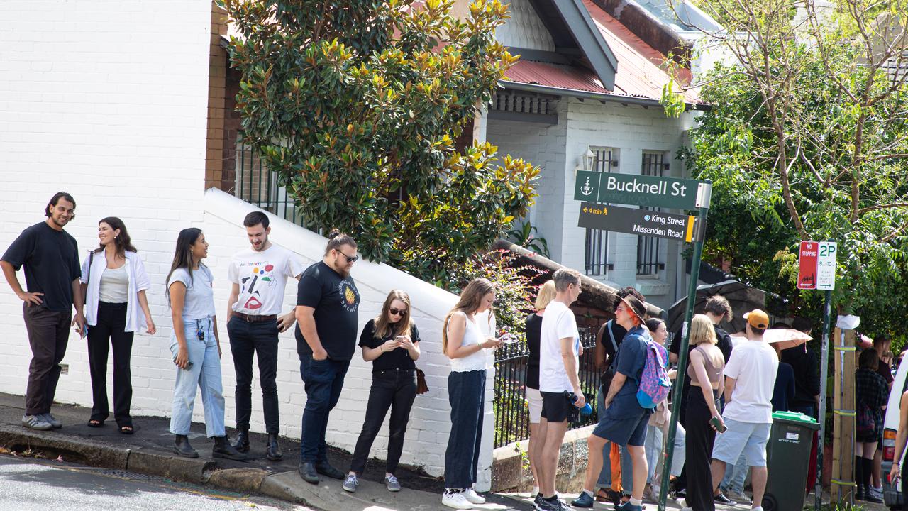 A long line of people waiting to inspect rental accommodation snakes around the block in Newtown, Sydney, as the rental housing shortage squeezes the nation. Picture: Chris Pavlich for The Australian