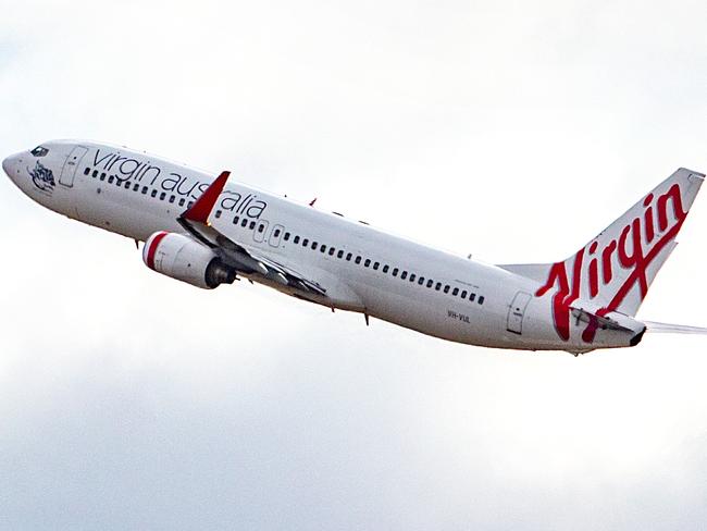 MELBOURNE, AUSTRALIA- NewsWire Photos APRIL 15 2021:  Virgin airline announce first International locations it will fly to from Australia once borders reopen. Virgin Flight takes off from Melbourne Airport.  Picture: NCA NewsWire / Sarah Matray