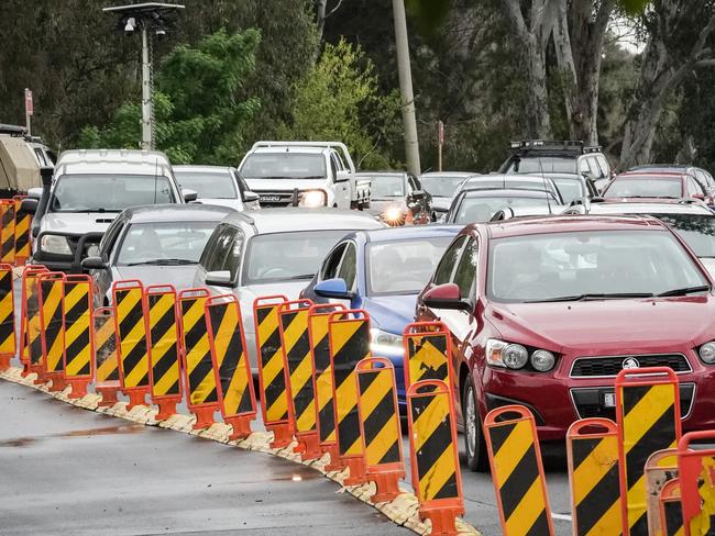 Herald Sun - Albury NSW - Friday 18th Sept 2020Police and military checking people entering into NSW from Victoria near the Victorian NSW border in Albury.Picture: Simon Dallinger.