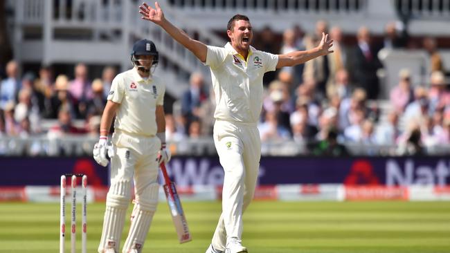 Josh Hazlewood, back in the Test side in place of James Pattinson, celebrates the wicket of England skipper Joe Root during the first session at Lord’s. Picture: AFP