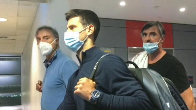 Novak Djokovic lost a legal battle on January 16 in Australia to stay and play in the Australian Open tennis tournament over his coronavirus vaccination status. (Photo by AFPTV / AFP)