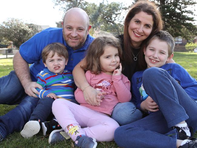 Jacquie and David Wolf from Kingsford pictured with their kids Eitan, Tahlia, 4, and Noah, 1. David Wolf,  who runs small business PR firm Closer Communications says the childcare policy through the Covid-19 crisis has left services out of pocket and families needing care. Picture: David Swift