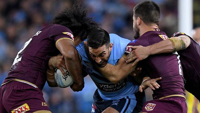 NSW prop Paul Vaughan charges ahead. Photo: AAP