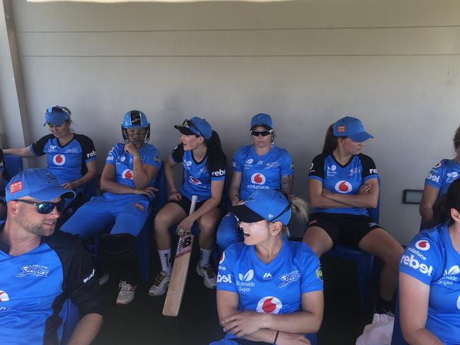 The team sits as opening batters head to the field. Picture: SUPPLIED/JAMIE ANDERSON