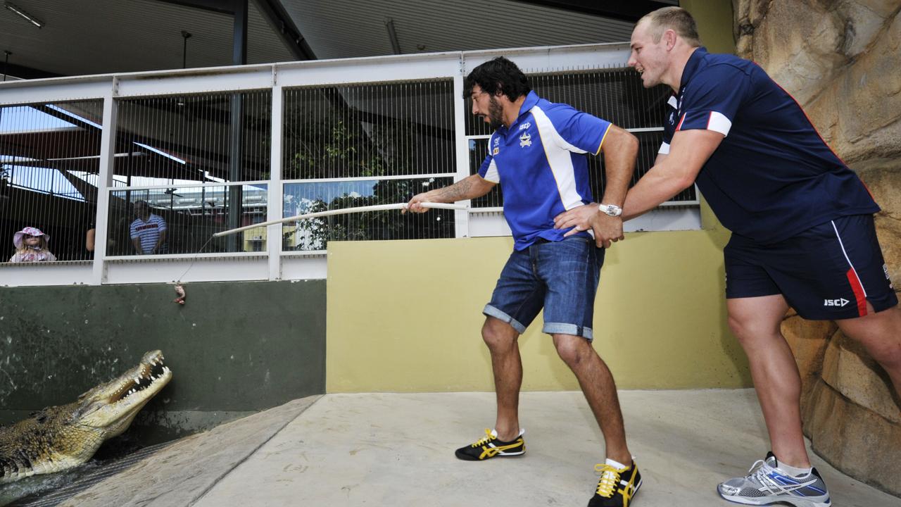 Kennedy, pictured with Cowboys legend Johnathan Thurston, at Crocosaurus Cove in Darwin.